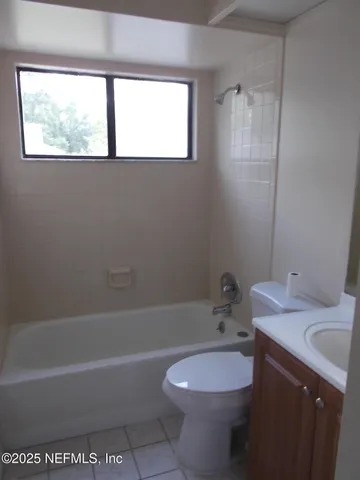 a bathroom with a sink a toilet and a bathtub