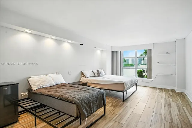 $600,000 | 3600 Mystic Pointe Drive, Unit 305, Aventura, FL 33180