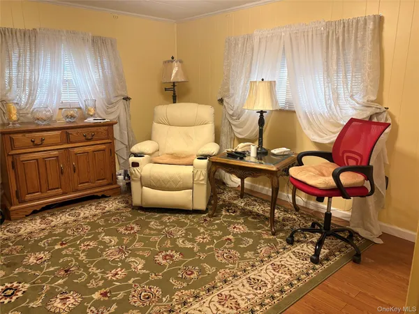 $199,999 | 525-207 Riverleigh Avenue, Unit 207, Riverhead, NY 11901