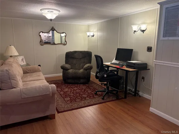 $199,999 | 525-207 Riverleigh Avenue, Unit 207, Riverhead, NY 11901