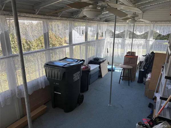 $199,999 | 525-207 Riverleigh Avenue, Unit 207, Riverhead, NY 11901