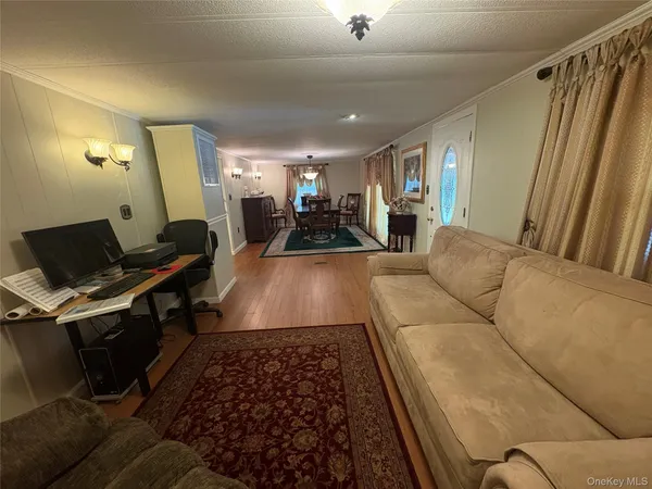 $199,999 | 525-207 Riverleigh Avenue, Unit 207, Riverhead, NY 11901