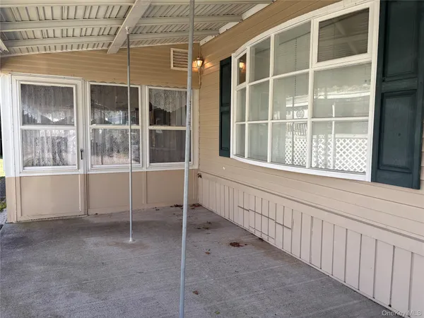 $199,999 | 525-207 Riverleigh Avenue, Unit 207, Riverhead, NY 11901