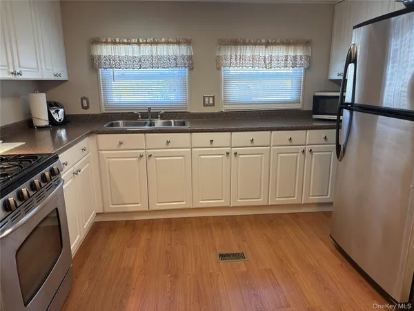 $199,999 | 525-207 Riverleigh Avenue, Unit 207, Riverhead, NY 11901