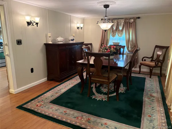 $199,999 | 525-207 Riverleigh Avenue, Unit 207, Riverhead, NY 11901