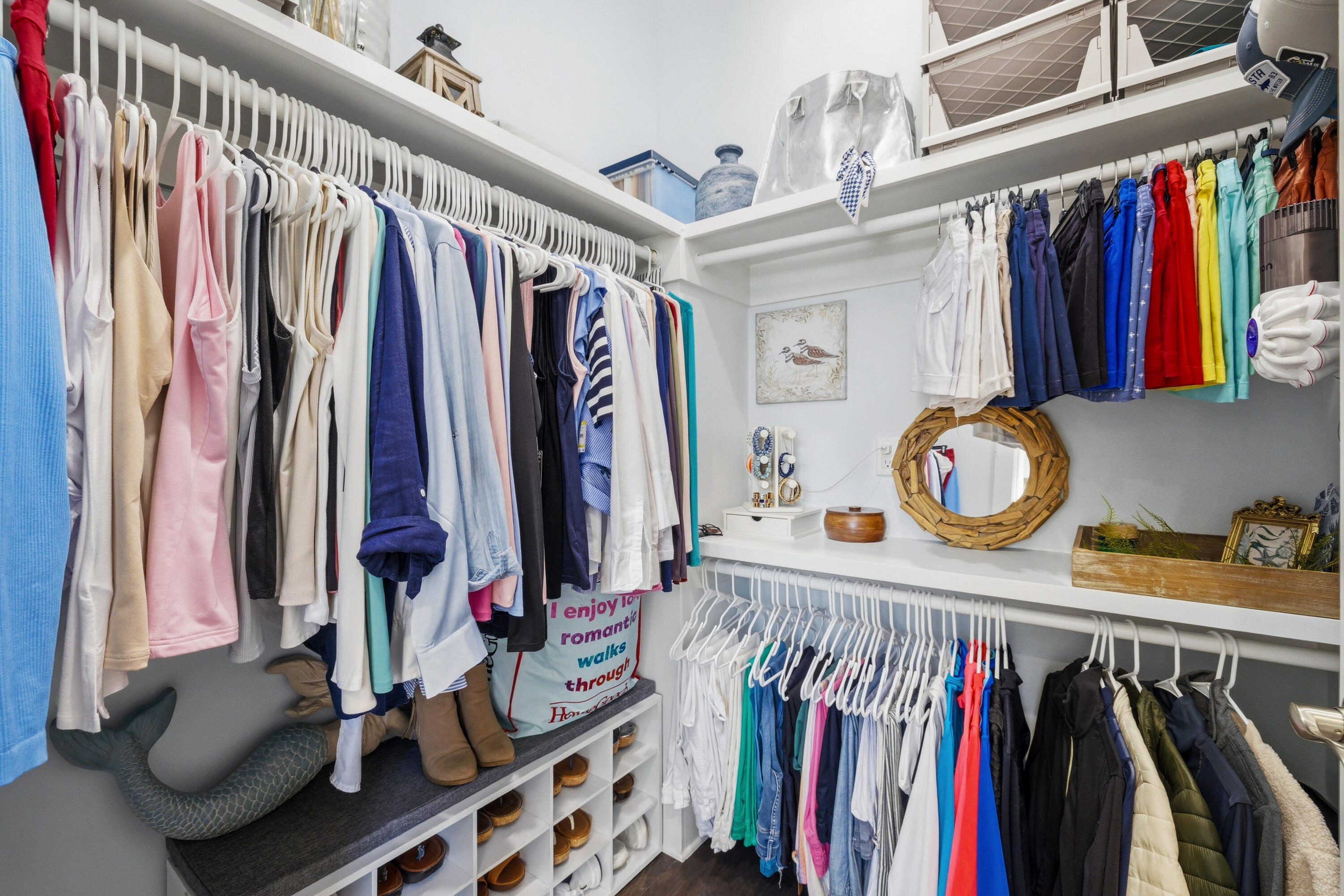 410 Gulfview Circle Santa Rosa Beach, FL 32459 - Photo 27 of 76 a view of walk in closet with clothes and shoes