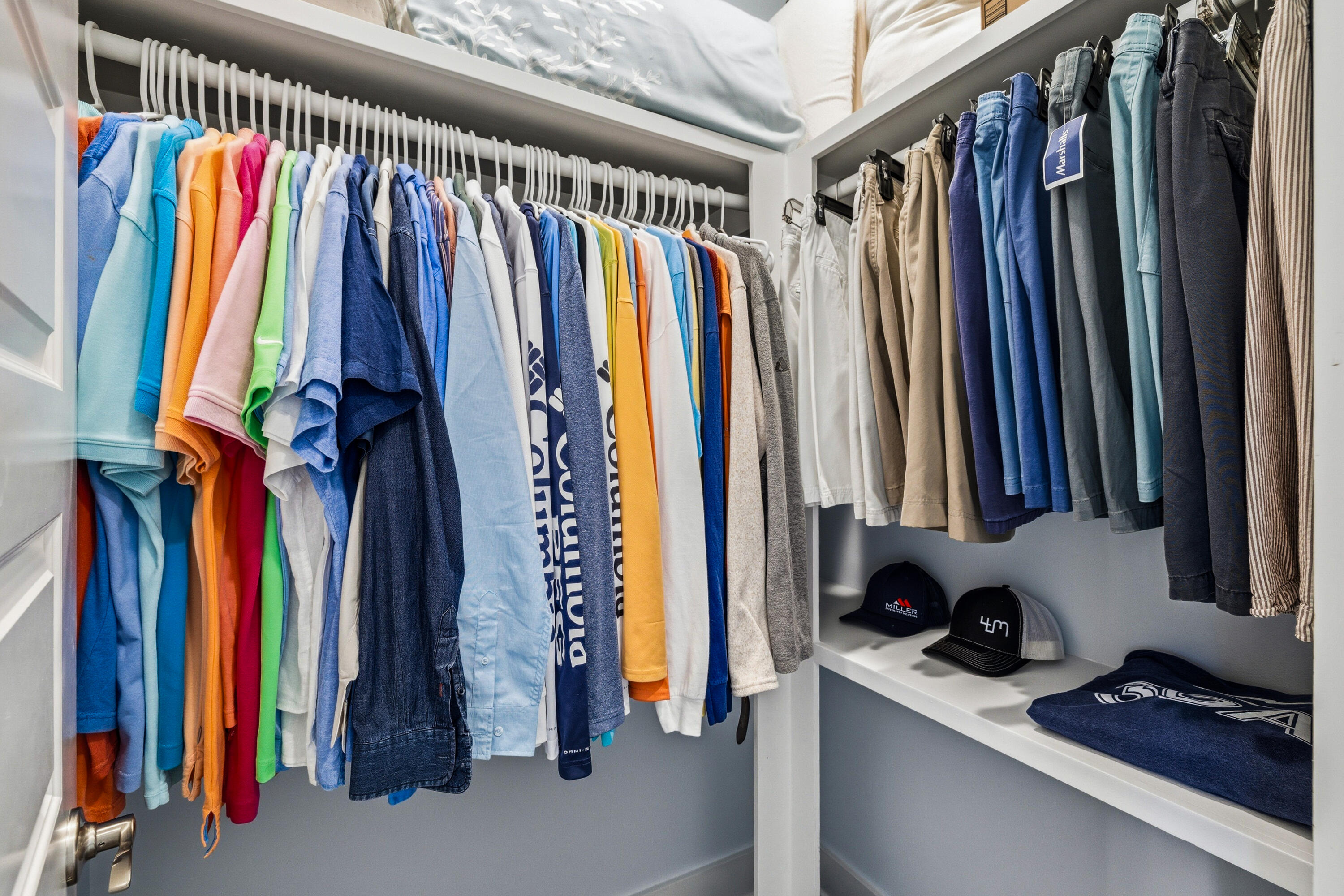410 Gulfview Circle Santa Rosa Beach, FL 32459 - Photo 32 of 76 a view of walk in closet with clothes and shoes