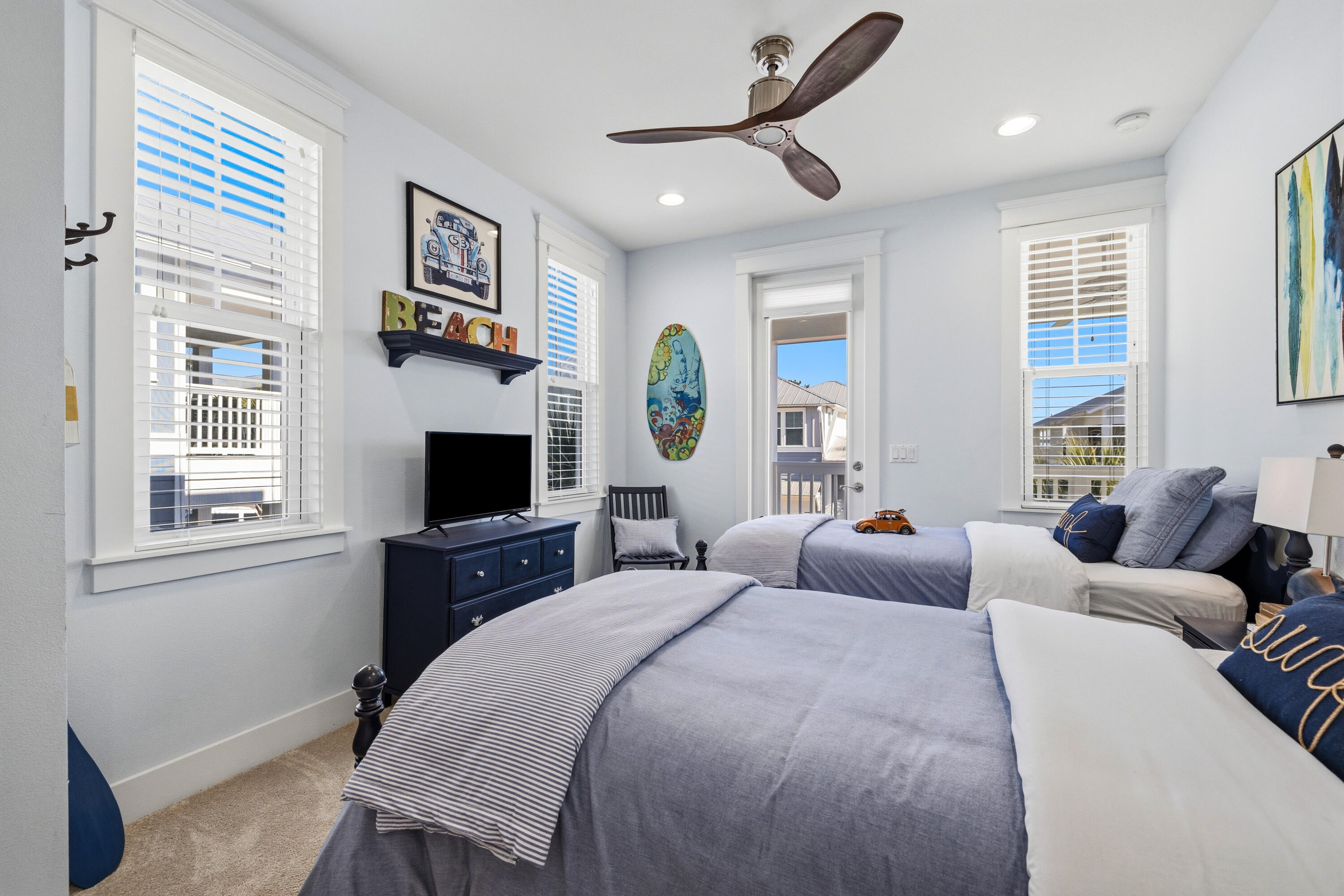 410 Gulfview Circle Santa Rosa Beach, FL 32459 - Photo 42 of 76 a bedroom with a bed window and a flat screen tv