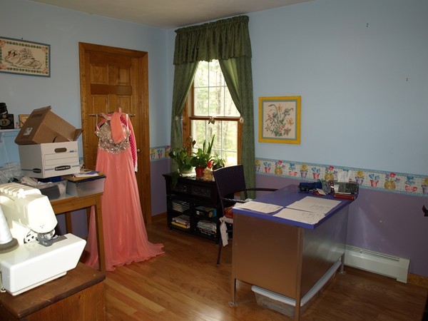 9 A Vinton Road Charlton, MA 01507 - Photo 8 of 23 a room with furniture and a window
