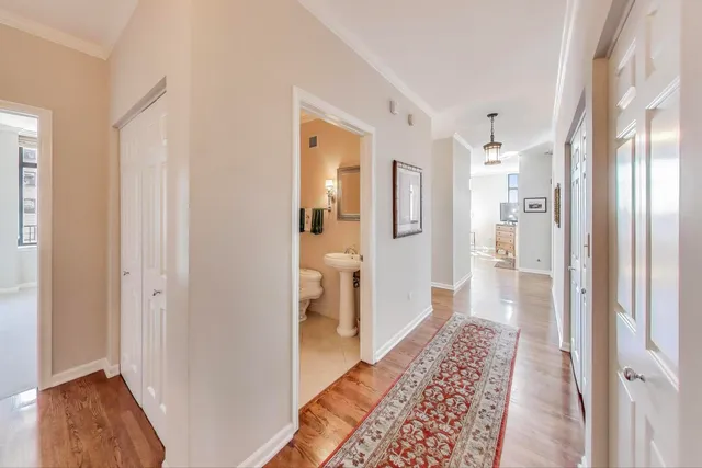 a bathroom with a glass door shower