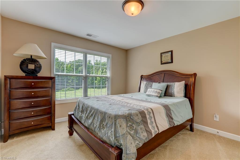 8933 Grove Park Drive Oak Ridge, NC 27310 - Photo 26 of 36 3RD BEDROOM