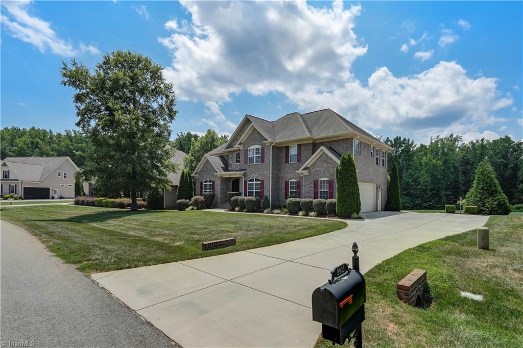 8933 Grove Park Drive Oak Ridge, NC 27310 - Photo 3 of 36 FRONT VIEW FROM DRIVE