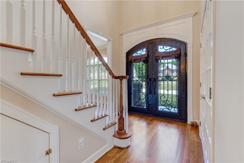 8933 Grove Park Drive Oak Ridge, NC 27310 - Photo 4 of 36 DOUBLE WROUGHT IRON DOOR ENTRANCE