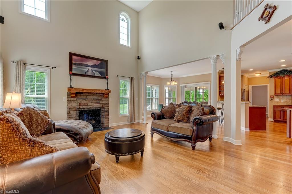 8933 Grove Park Drive Oak Ridge, NC 27310 - Photo 5 of 36 GREAT ROOM OPEN TO KITCHEN AND DINETTE