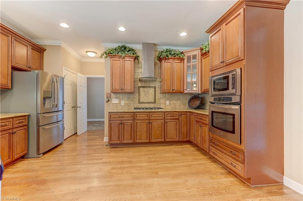 8933 Grove Park Drive Oak Ridge, NC 27310 - Photo 9 of 36 KITCHEN