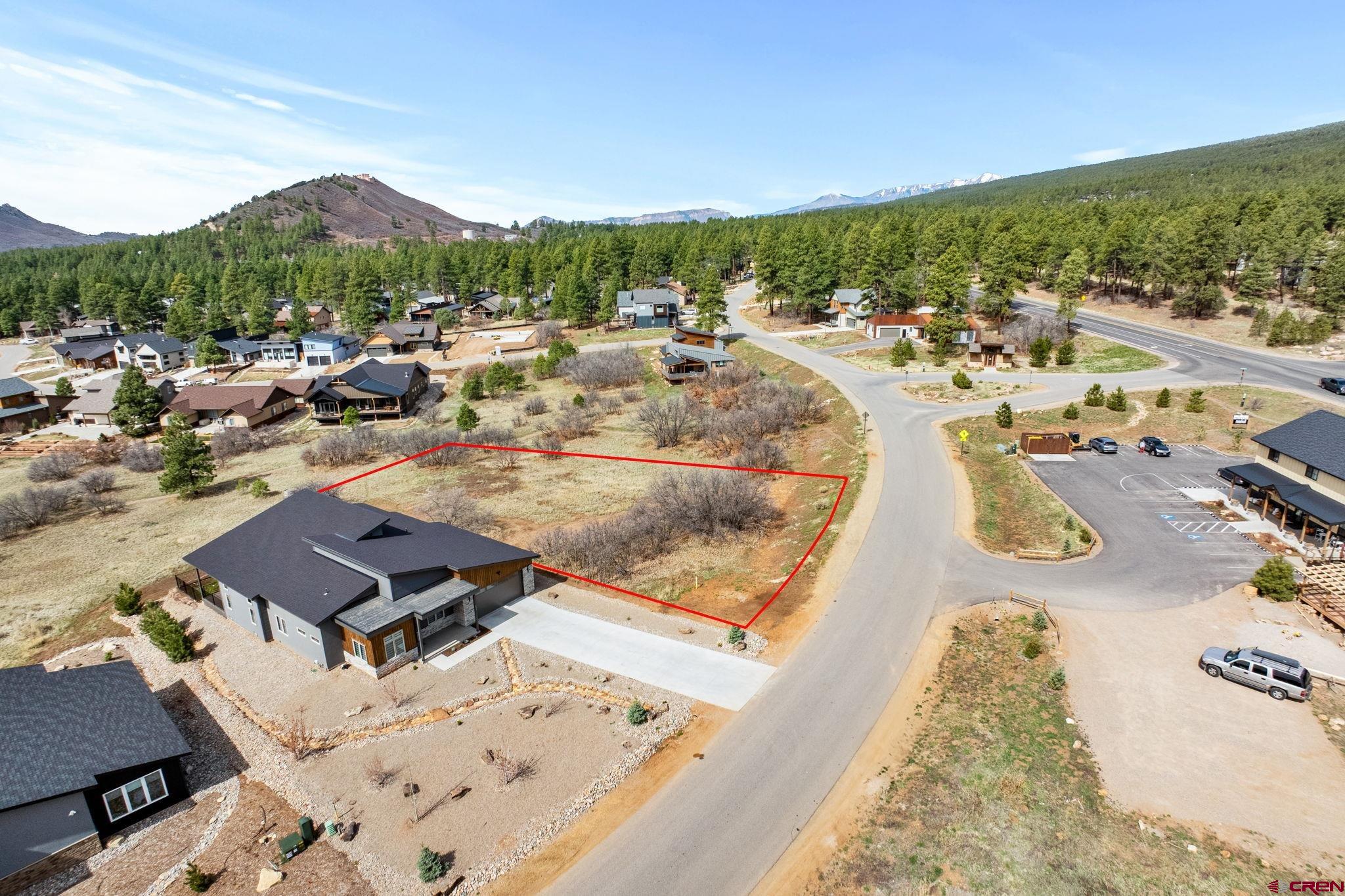 671 Edgemont Meadows Road Durango, CO 81301 - Photo 2 of 15 a view of a swimming pool with a lake view