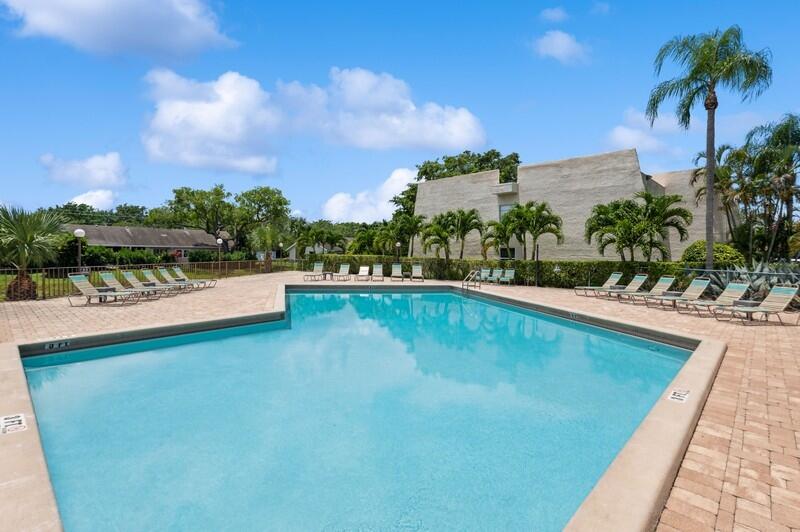 2700 Fiore Way, Unit 211 Delray Beach, FL 33445 - Photo 13 of 15 13_2700FioreWay_29_Pool_FlexMLS800x600_8