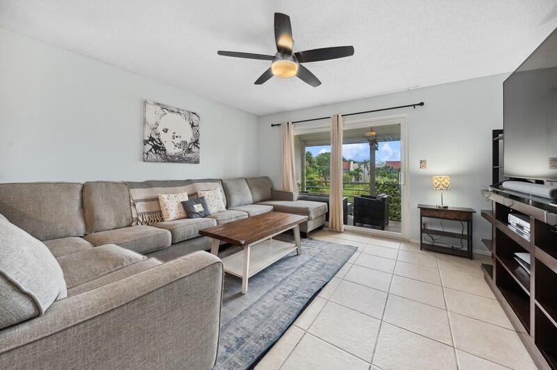 2700 Fiore Way, Unit 211 Delray Beach, FL 33445 - Photo 4 of 15 03_2700FioreWay_1_LivingRoom_FlexMLS800x
