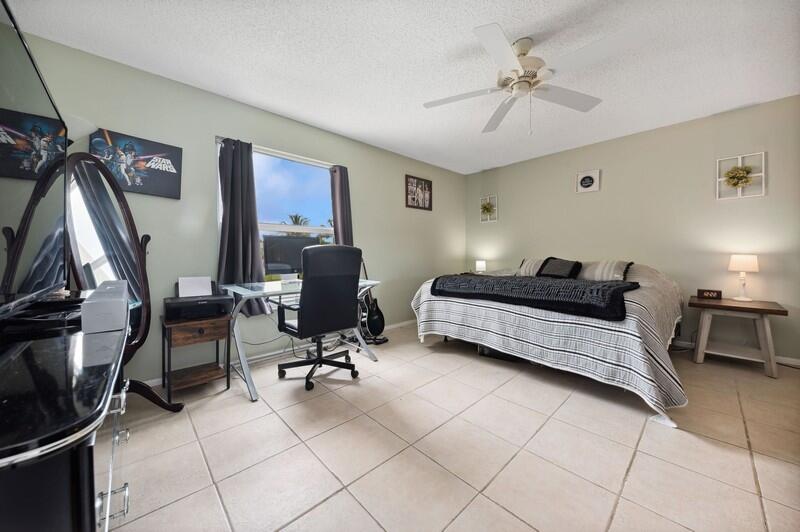 2700 Fiore Way, Unit 211 Delray Beach, FL 33445 - Photo 7 of 15 06_2700FioreWay_14_PrimaryBedroom_FlexML