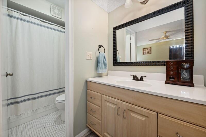 2700 Fiore Way, Unit 211 Delray Beach, FL 33445 - Photo 8 of 15 07_2700FioreWay_13_PrimaryBathroom_FlexM