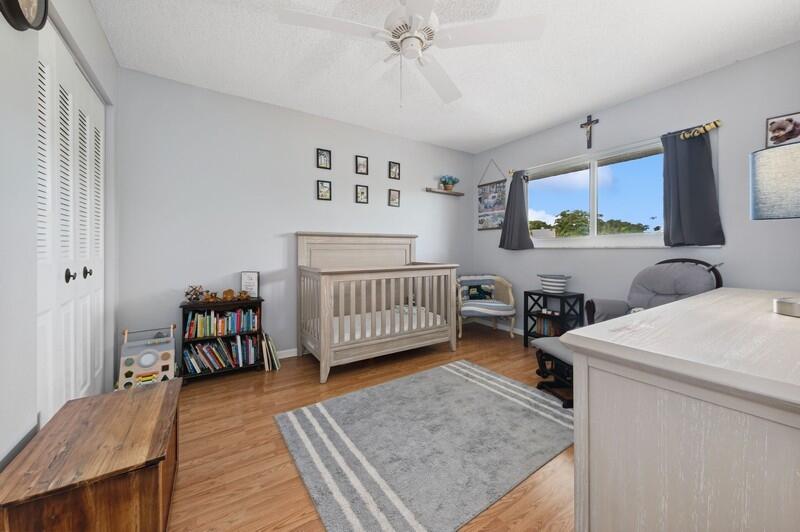 2700 Fiore Way, Unit 211 Delray Beach, FL 33445 - Photo 10 of 15 09_2700FioreWay_153_2ndBedroom_FlexMLS80