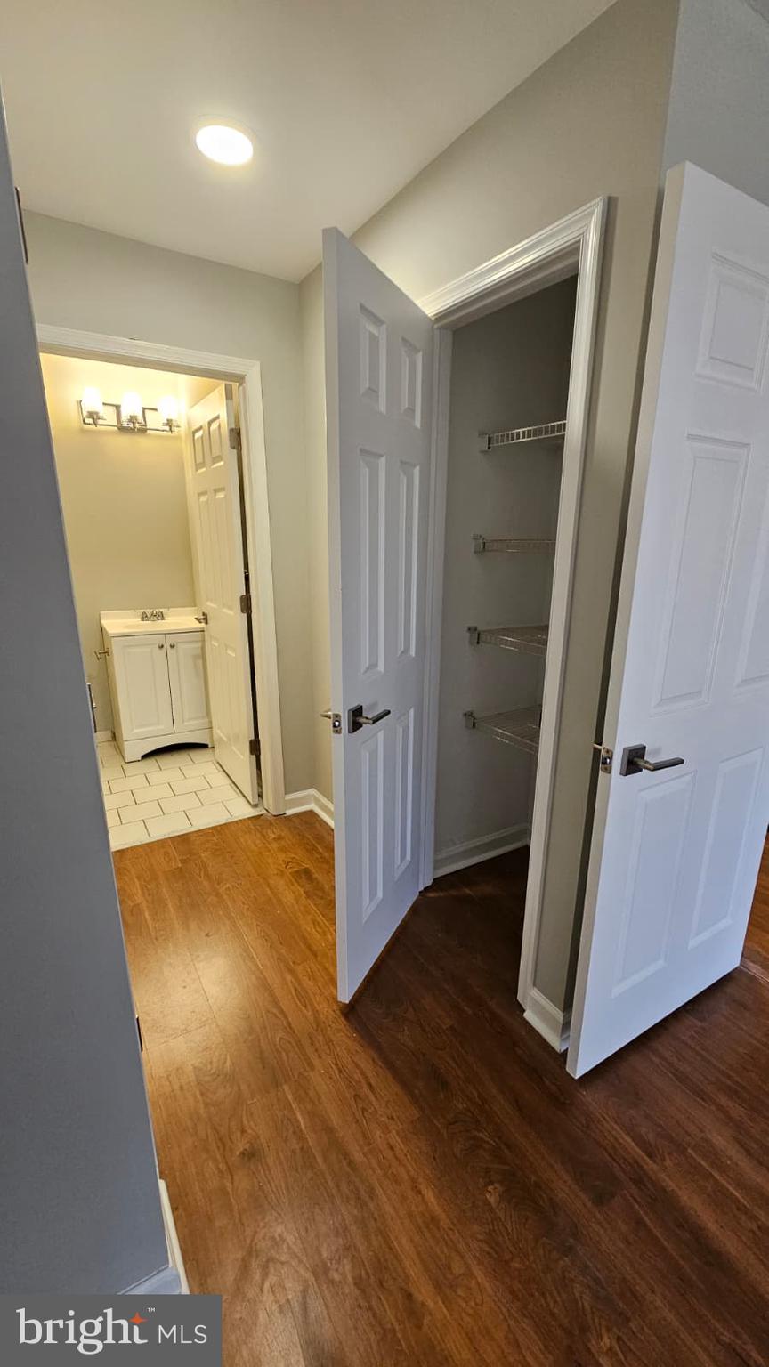 9228-38 Blue Grass Road, Unit 27 Philadelphia, PA 19114 - Photo 7 of 15 an entryway door with wooden floor