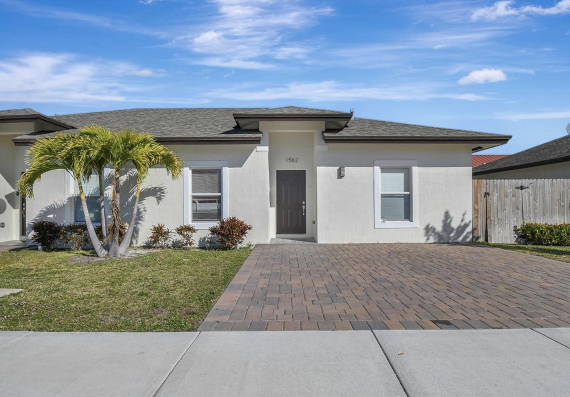 1562 West 26th Court Riviera Beach, FL 33404 - Photo 1 of 14 1