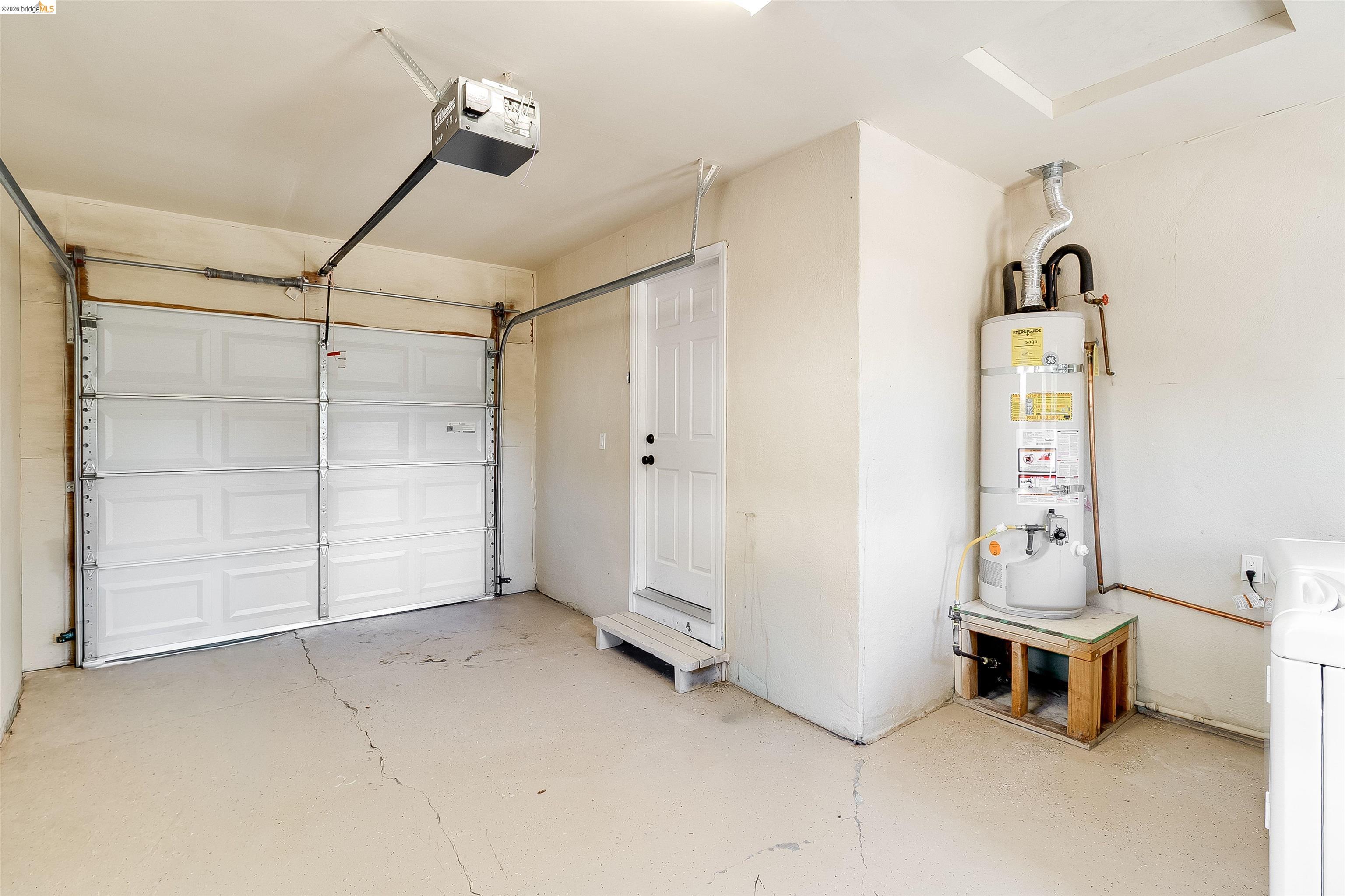 346 Valley View Road Pleasant Hill, CA 94523 - Photo 38 of 57 Two-car garage with overhead door opener and concrete flooring