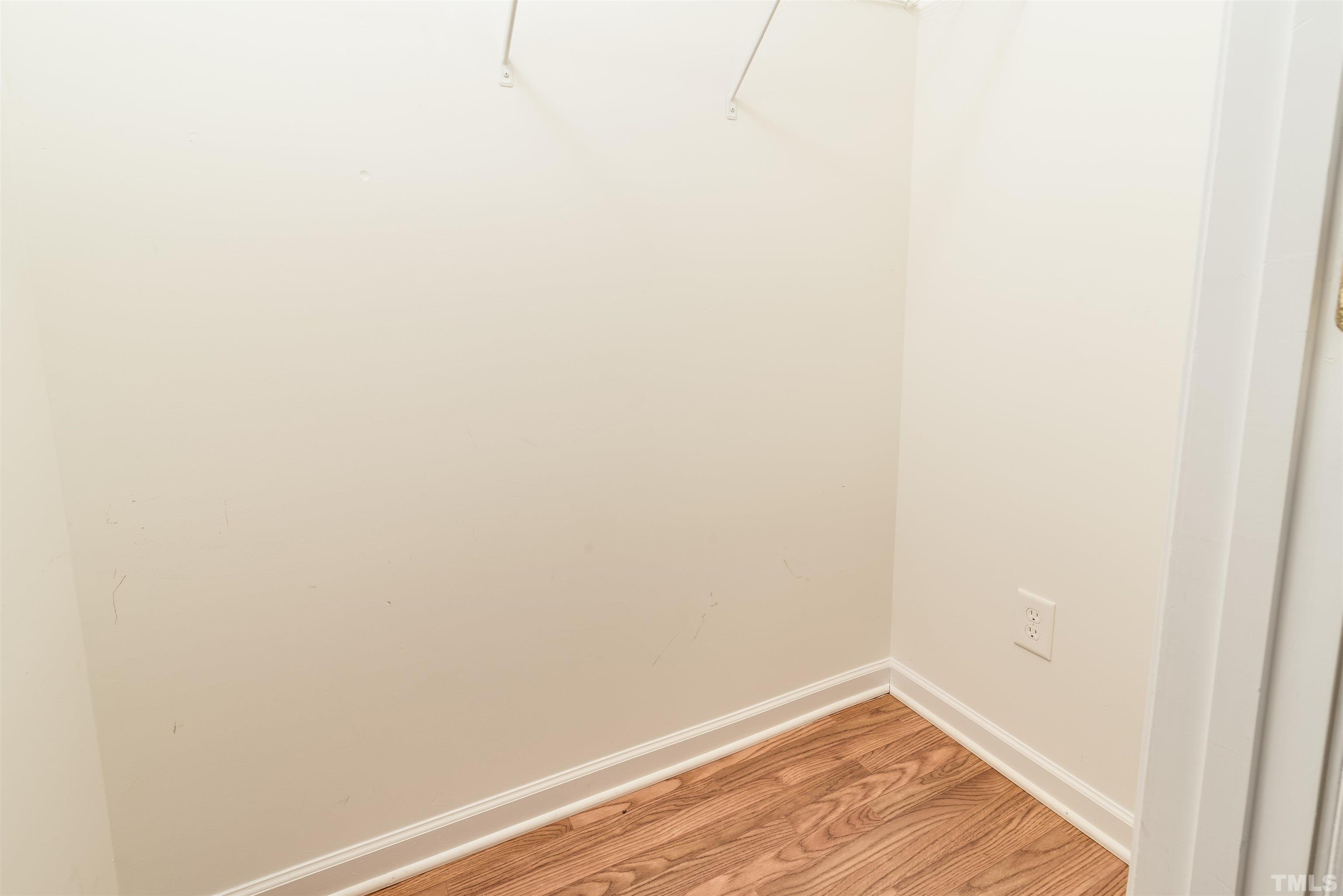 105 Graystar Road Apex, NC 27502 - Photo 15 of 35 a view of a small space with wooden floor