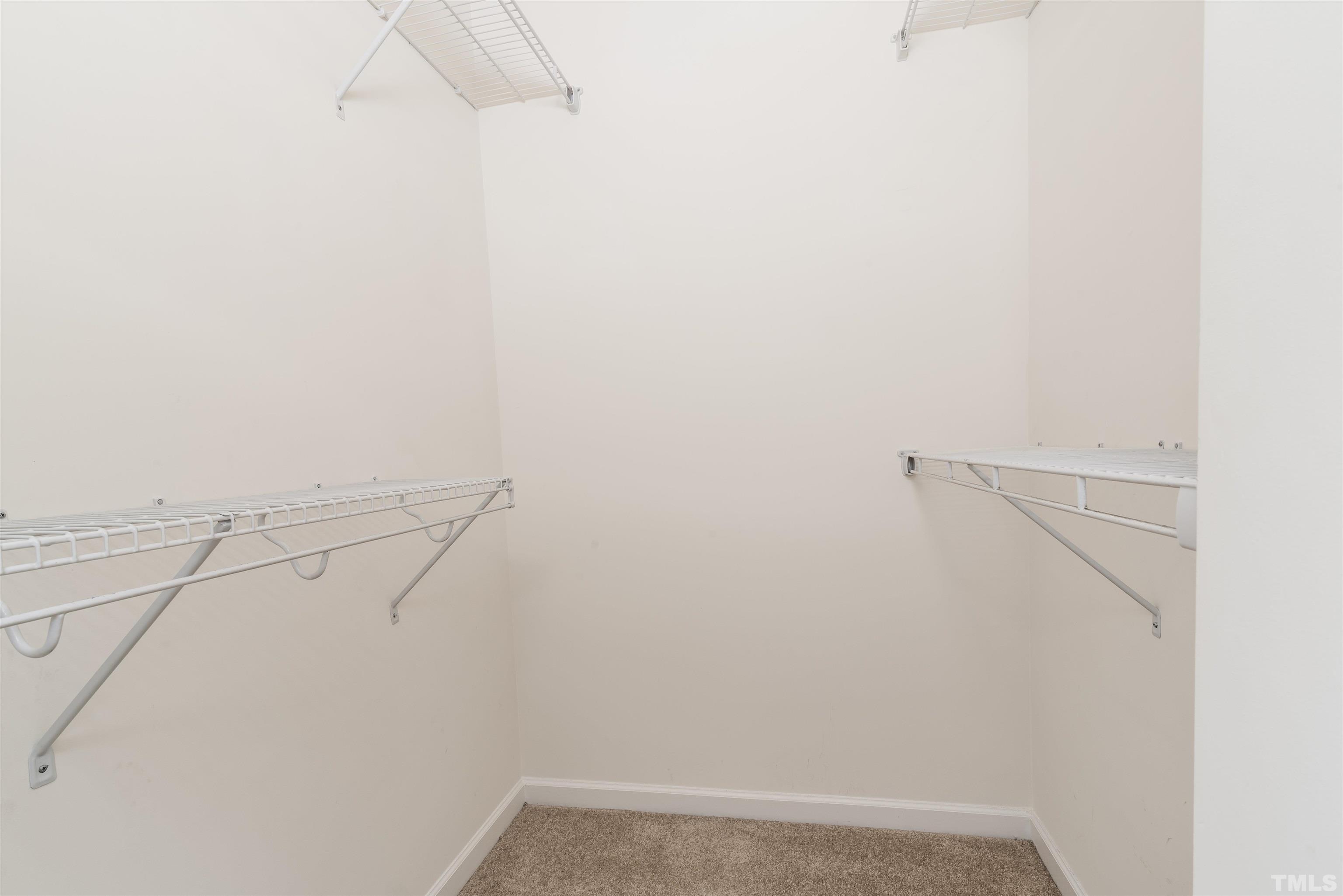 105 Graystar Road Apex, NC 27502 - Photo 30 of 35 a view of small space with racks on the wall