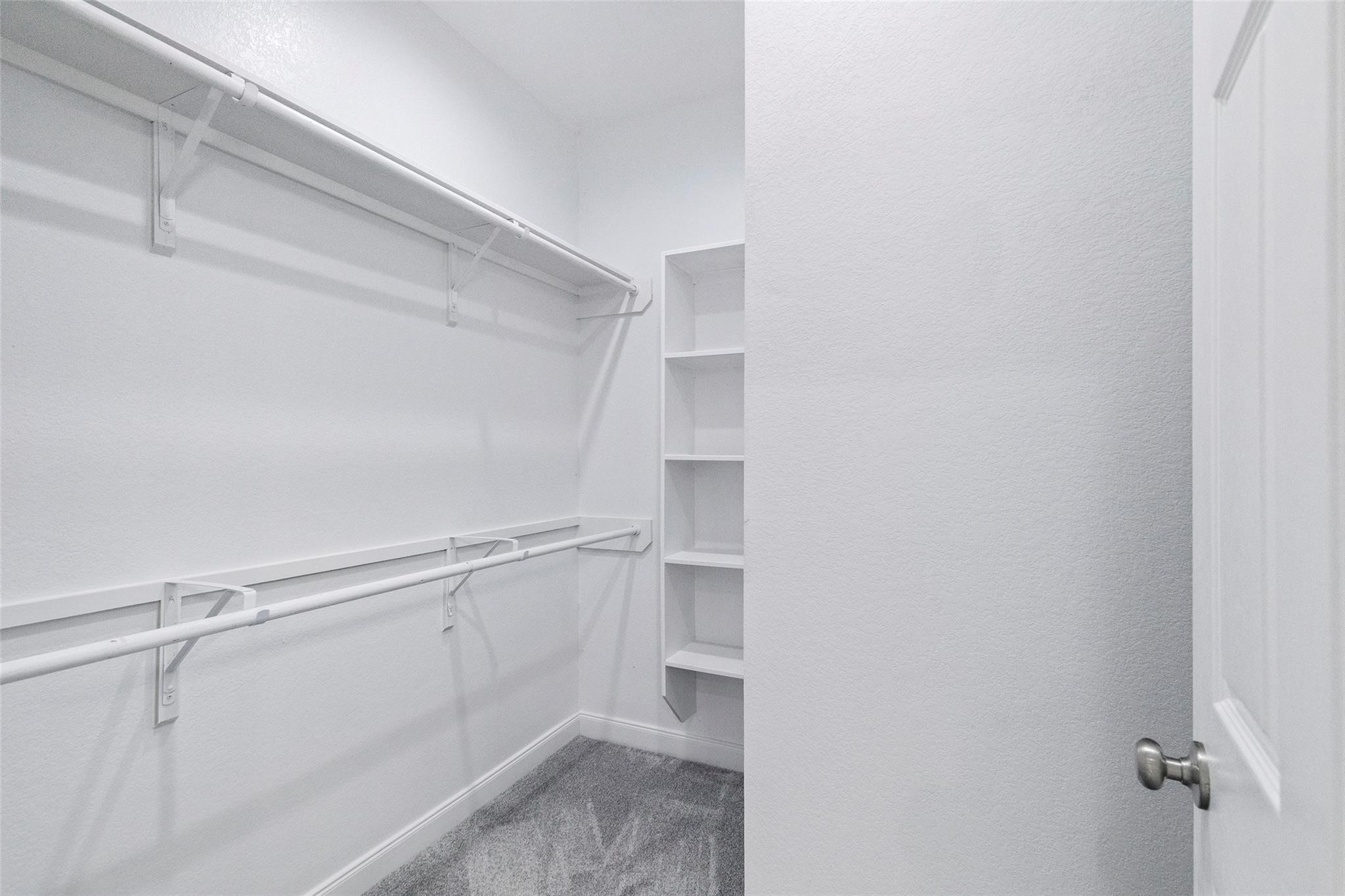 7655 Ameswood Road Houston, TX 77095 - Photo 19 of 31 Primary Bedroom Closet