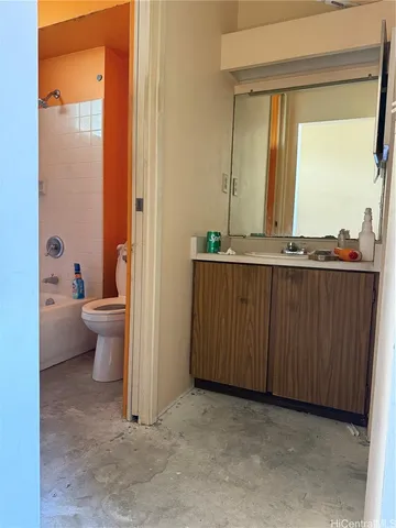 a view of a bathroom with a tub and a sink