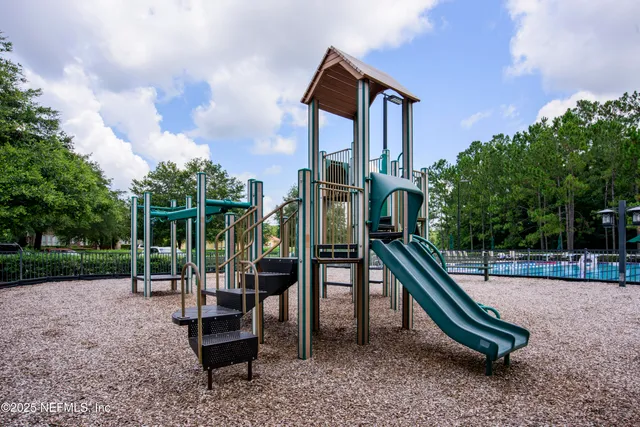 a park view with a bench in the park