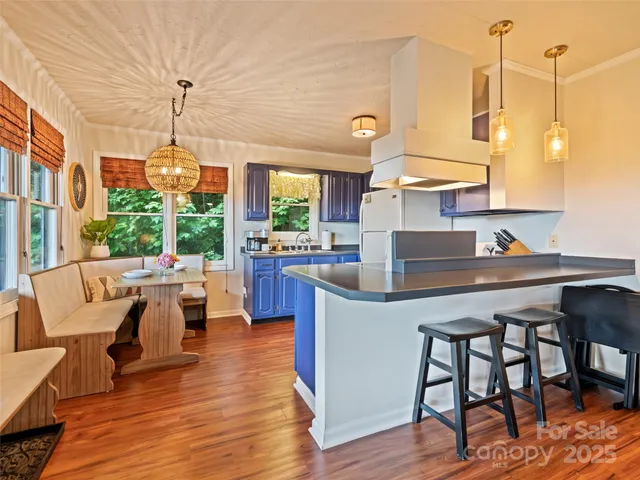 a white refrigerator freezer sitting in a kitchen