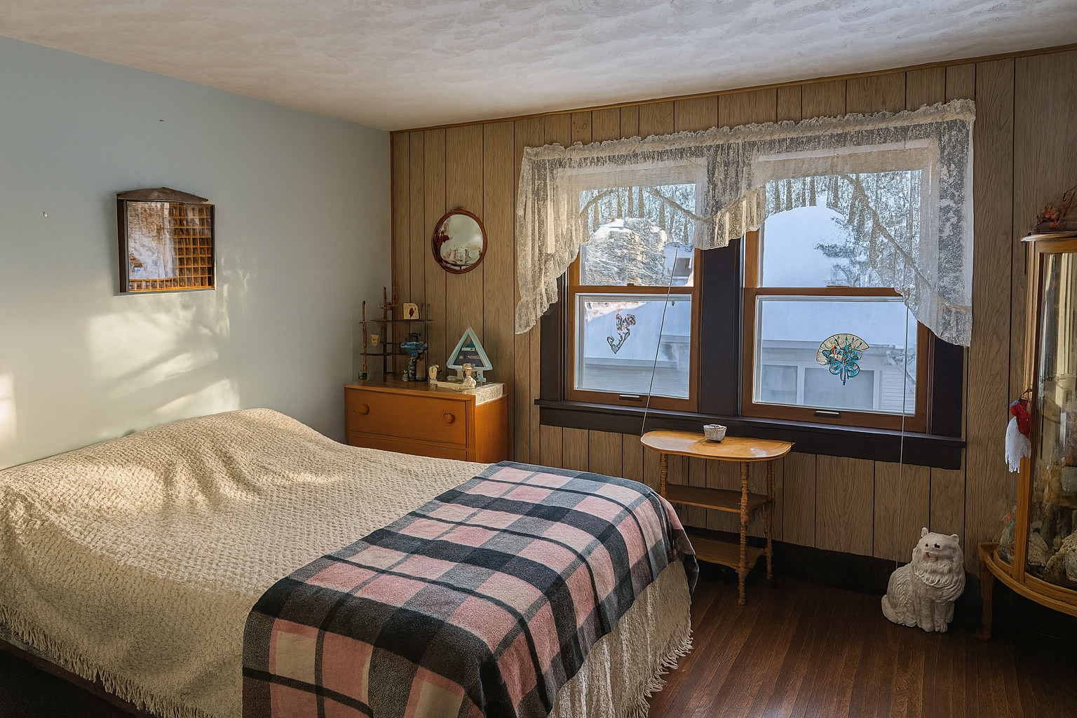 321 Eureka Street Genoa, IL 60135 - Photo 12 of 13 a bedroom with a bed and a large window with chair