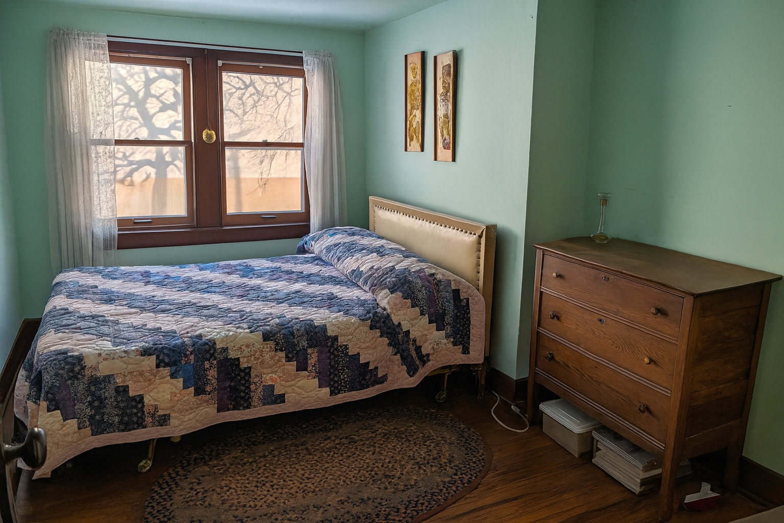 321 Eureka Street Genoa, IL 60135 - Photo 13 of 13 a bedroom with a bed and a window