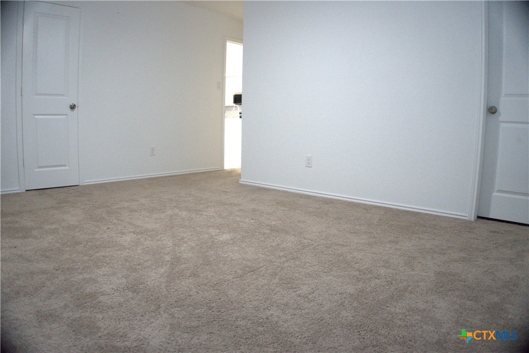 809 Riviera Court Seguin, TX 78155 - Photo 6 of 8 a view of an empty room