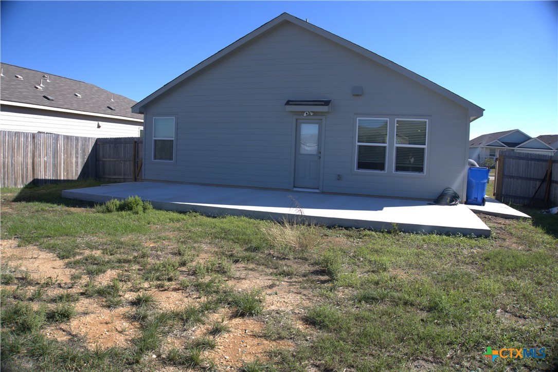 809 Riviera Court Seguin, TX 78155 - Photo 7 of 8 a view of a backyard