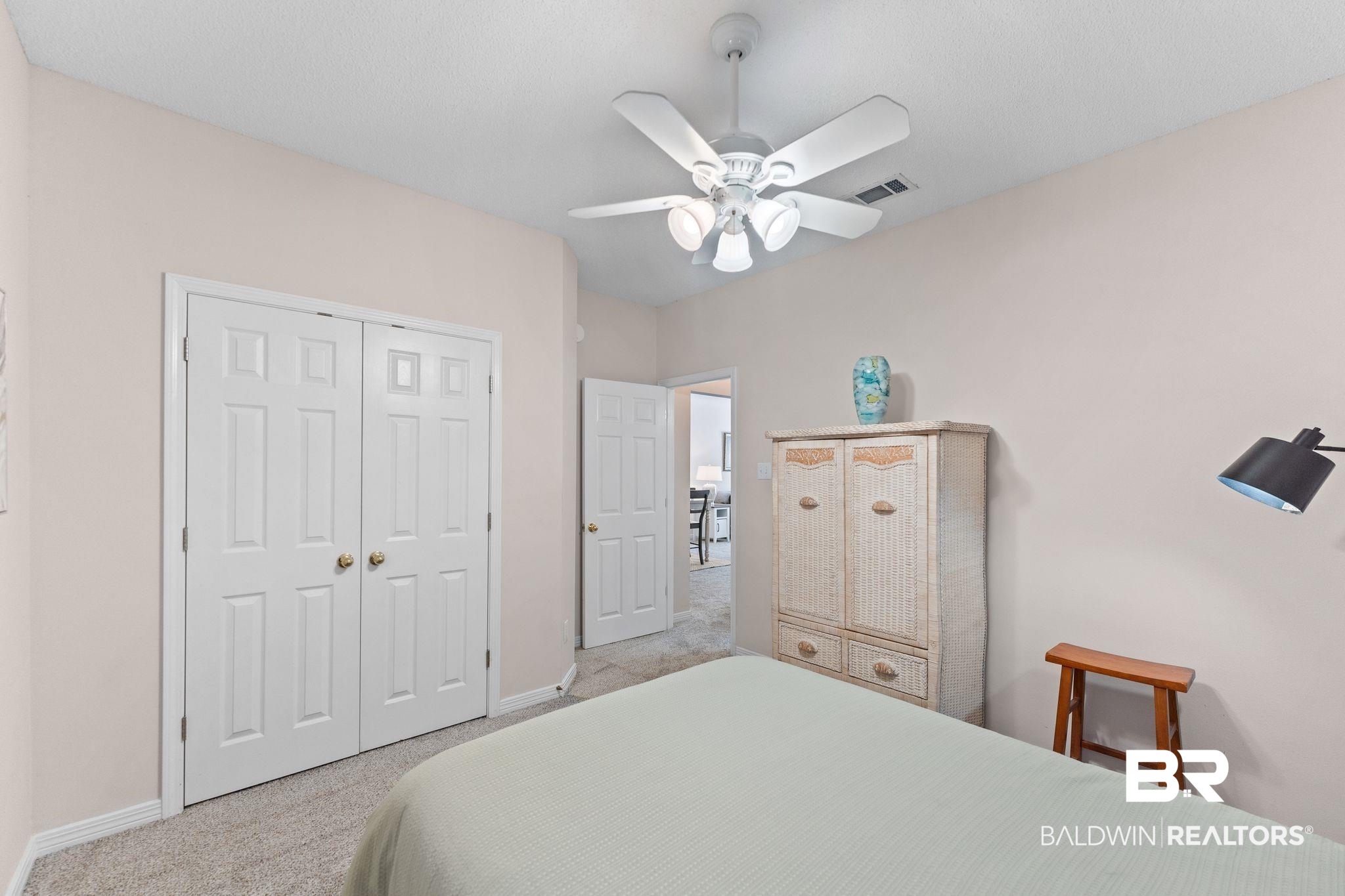 2651 South Juniper Street, Unit 203 Foley, AL 36535 - Photo 16 of 22 Carpeted bedroom with a closet and ceiling fan