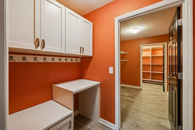 a view of bathroom with a sink and a mirror