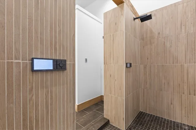 a bathroom with a double vanity sink mirror and