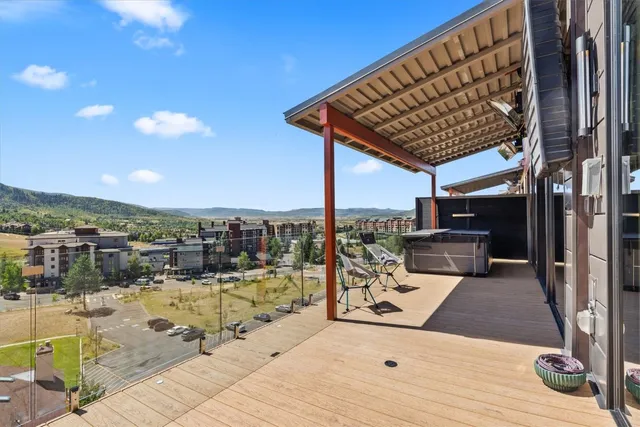 a view of a terrace with seating area