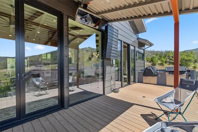 a view of a terrace with a garden