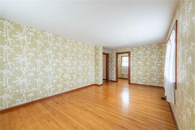 a view of a large window with wooden floor