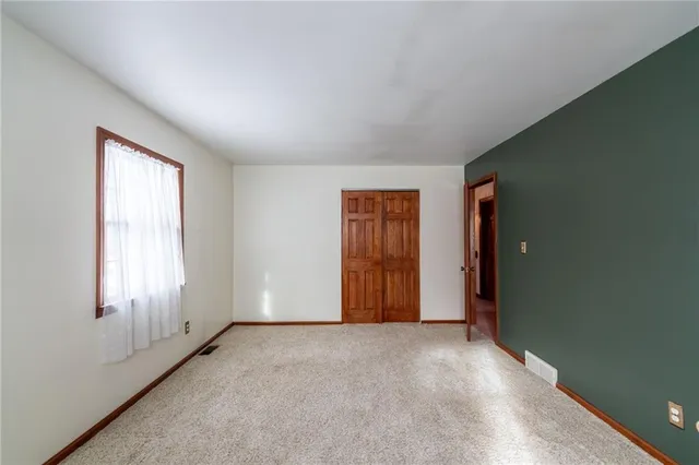 an empty room with closet