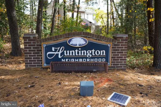 a sign on the side of the road