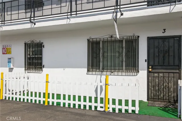 a bathroom with a sink a mirror and shower
