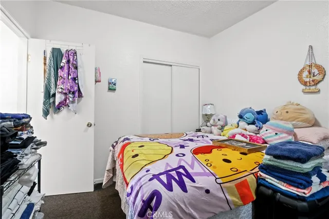 a bed room with a bed and a bed