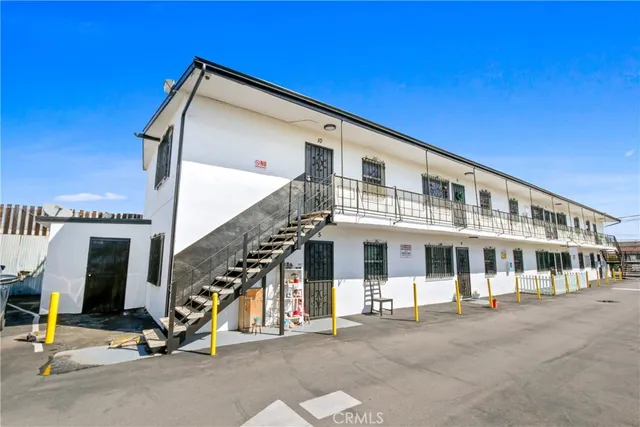 a view of a building with a floor to ceiling windows