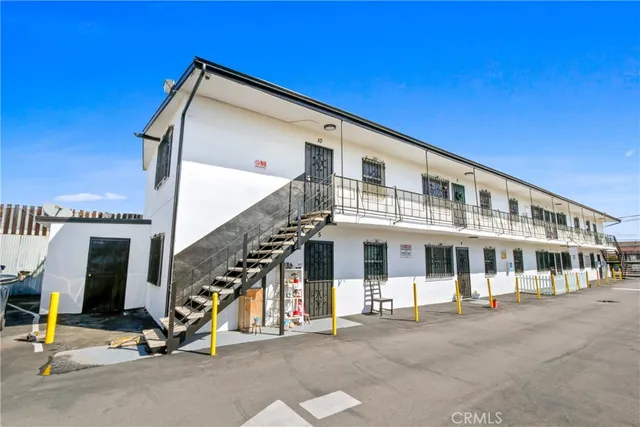 a view of a building with a floor to ceiling windows